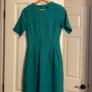 Green midi dress with pockets